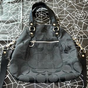 Black Coach with Purple interior. Model # H1171-18708